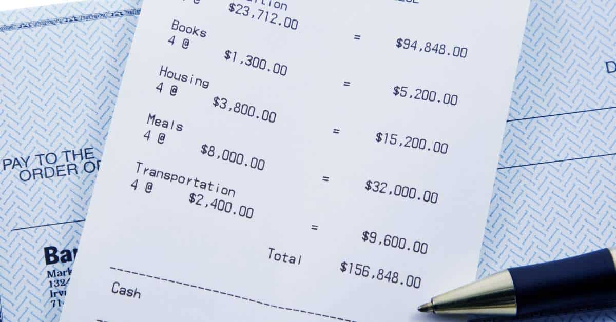 A receipt on a checkbook that lists the prices for college including housing, meals, etc.