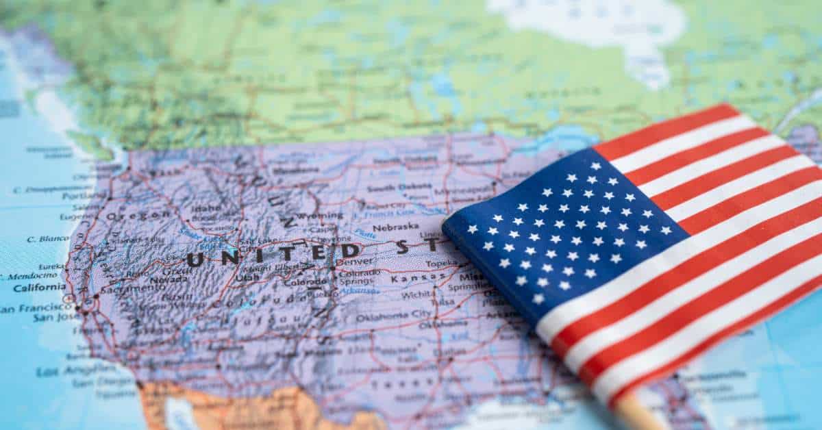 picture of the map of the United States with an American flag on top of it.