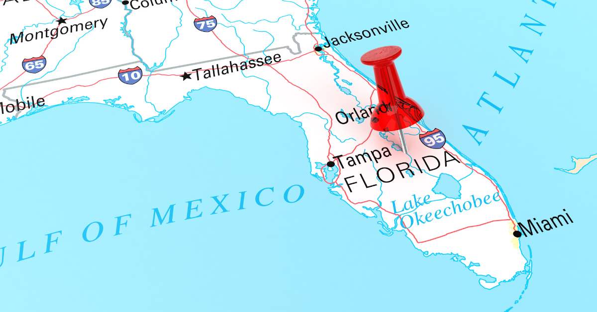 Picture of a map of Florida with a red tack in it